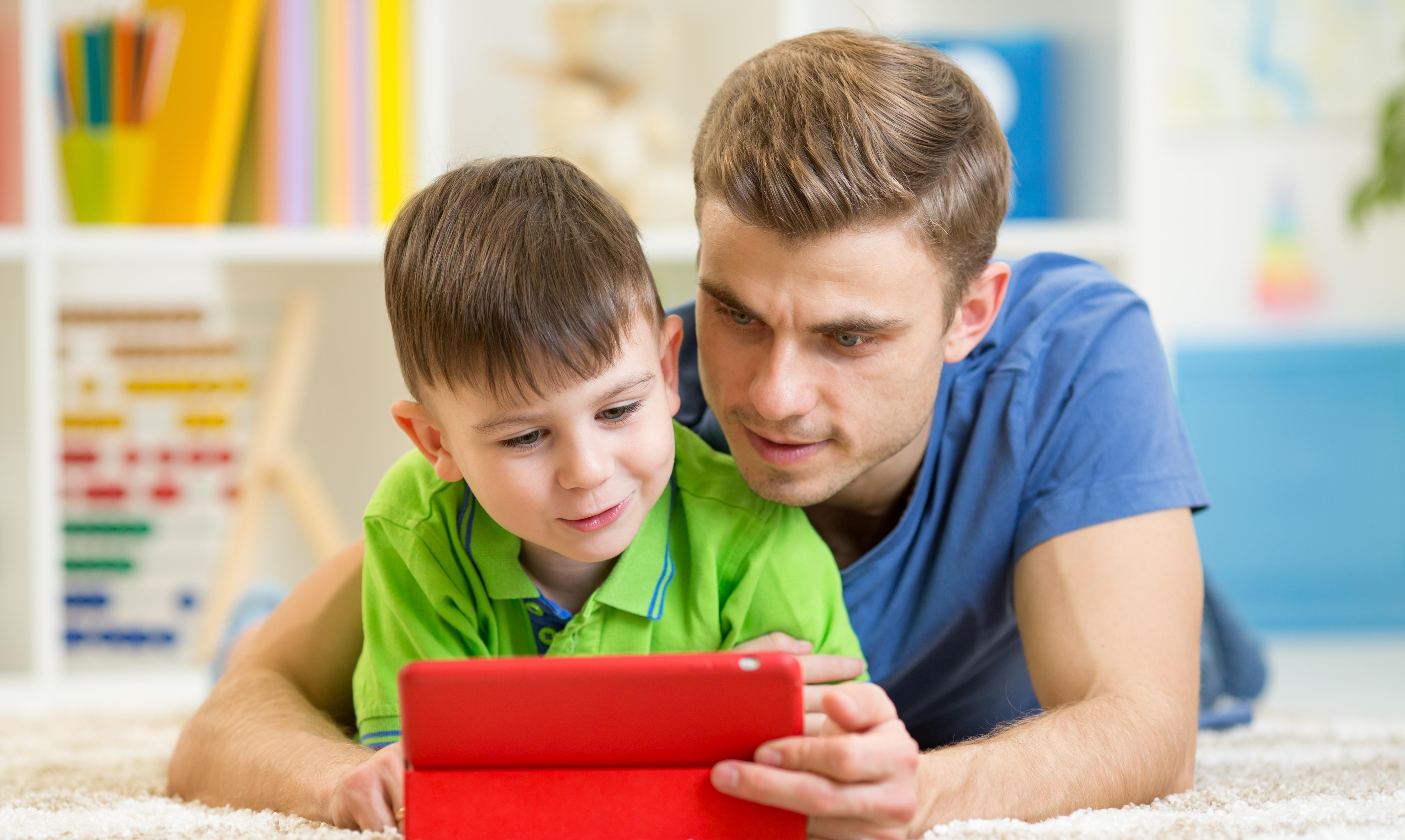 Children playing with educational apps